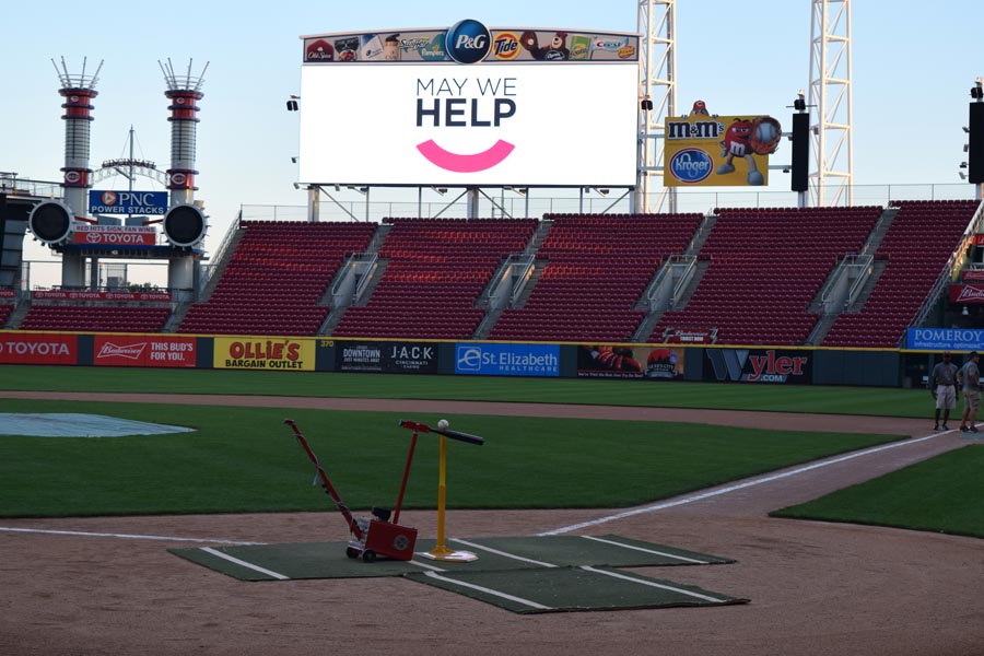 Batter up machine on the field at Great American Ballpark