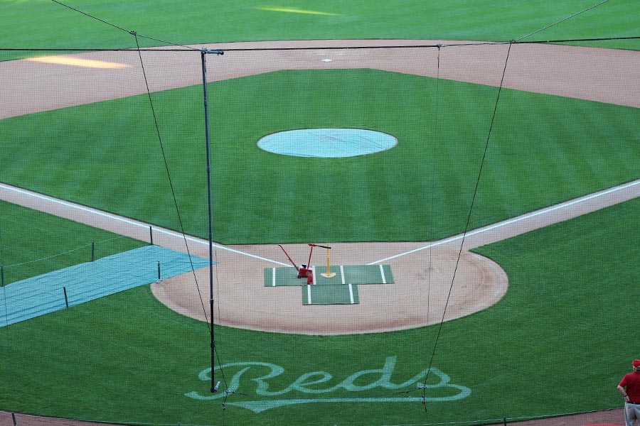 The field with May We Help's batting machine at the plate